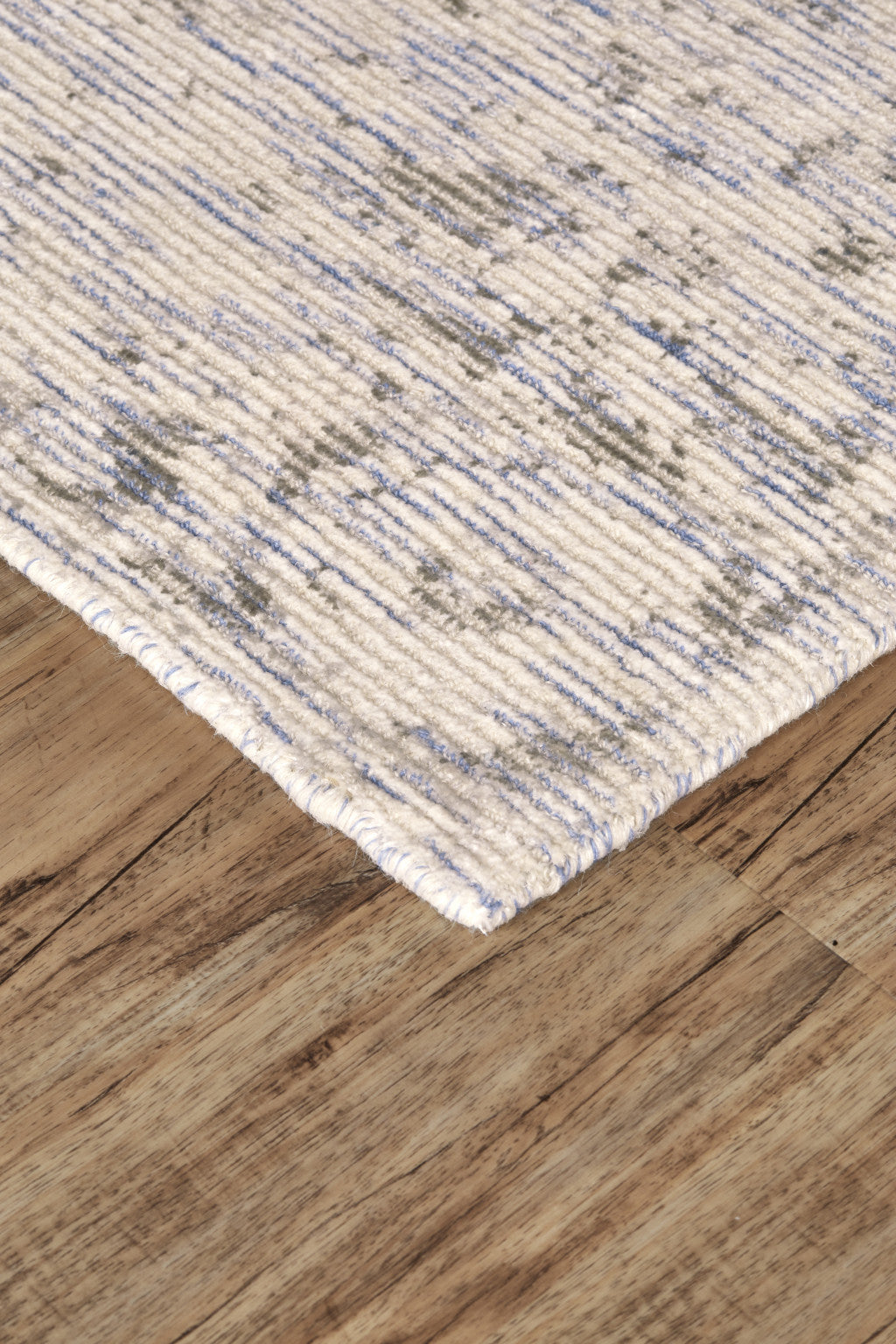 8' X 11' Ivory And Tan Abstract Hand Woven Area Rug