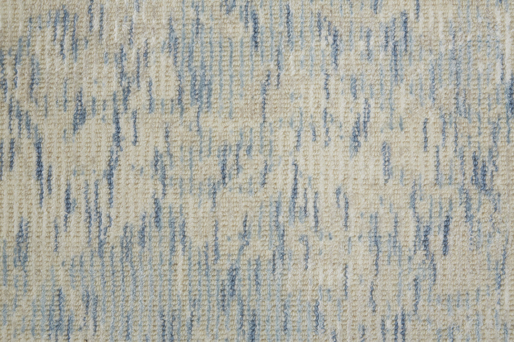 8' X 11' Ivory And Tan Abstract Hand Woven Area Rug