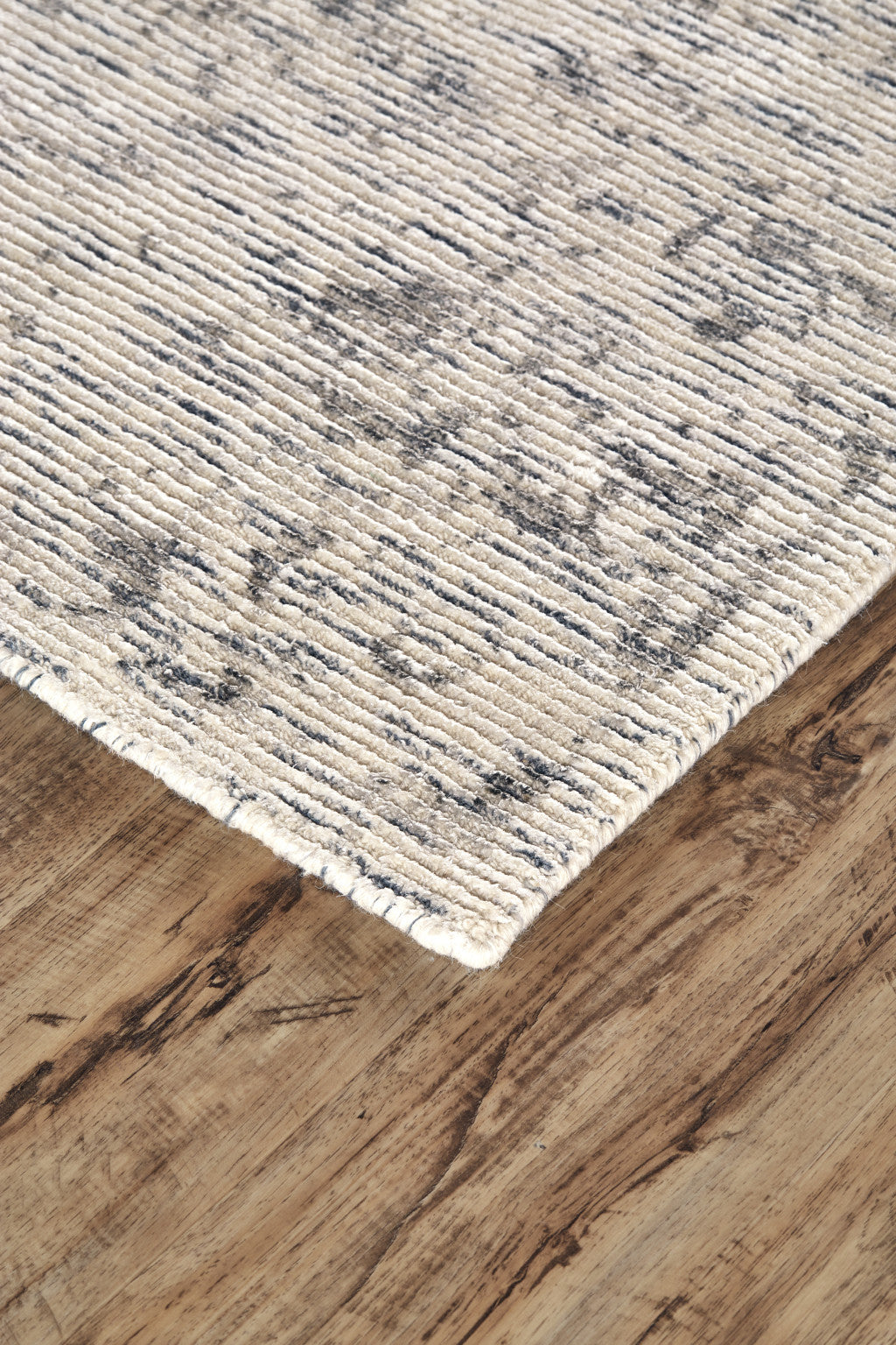 8' X 11' Ivory And Tan Abstract Hand Woven Area Rug