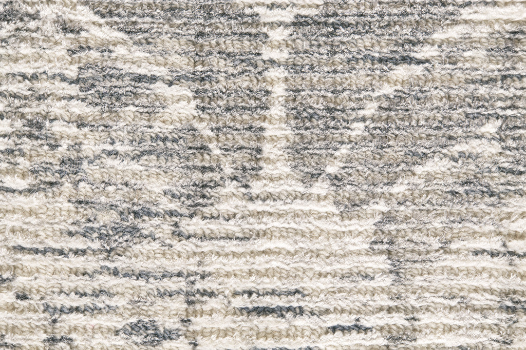 8' X 11' Ivory And Tan Abstract Hand Woven Area Rug