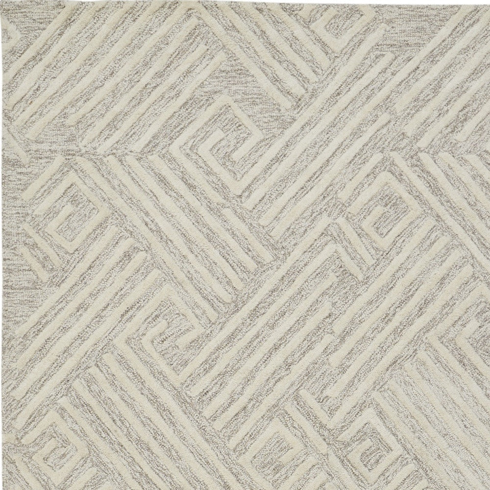 4' X 6' Tan And Ivory Wool Geometric Tufted Handmade Stain Resistant Area Rug
