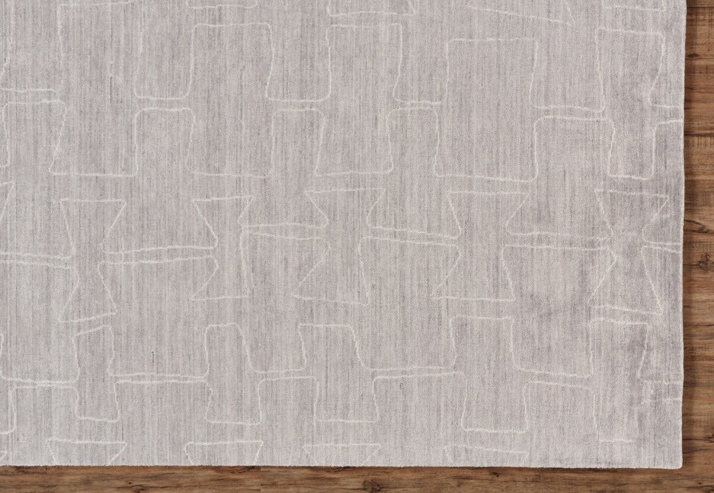 5' X 8' Gray Taupe And Ivory Abstract Hand Woven Area Rug