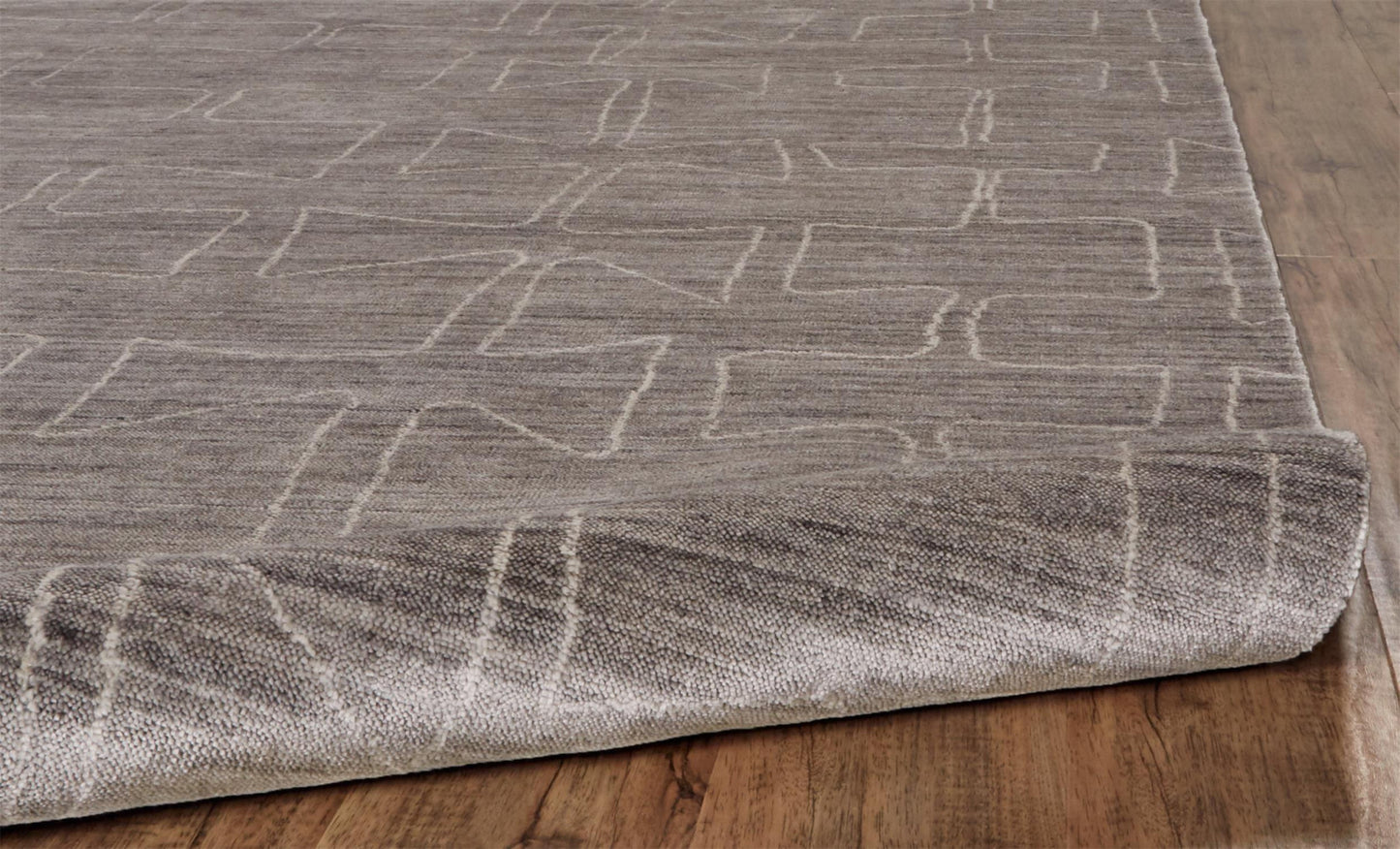 5' X 8' Gray Taupe And Ivory Abstract Hand Woven Area Rug