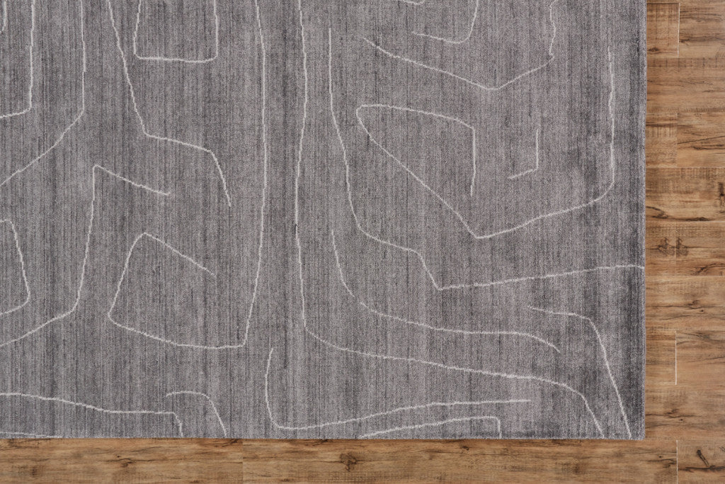 4' X 6' Gray And Ivory Abstract Hand Woven Area Rug