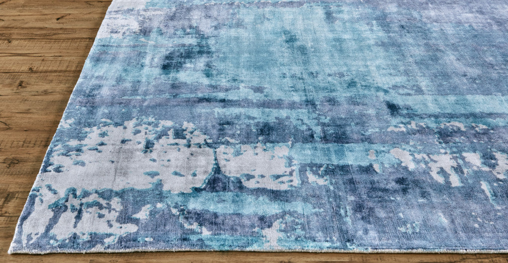 8' X 10' Blue And Ivory Abstract Hand Woven Area Rug