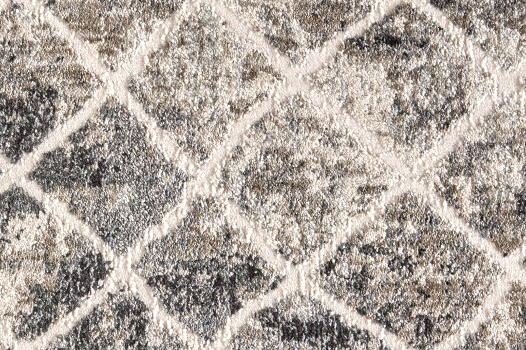 7' X 10' Ivory Gray And Taupe Abstract Stain Resistant Area Rug