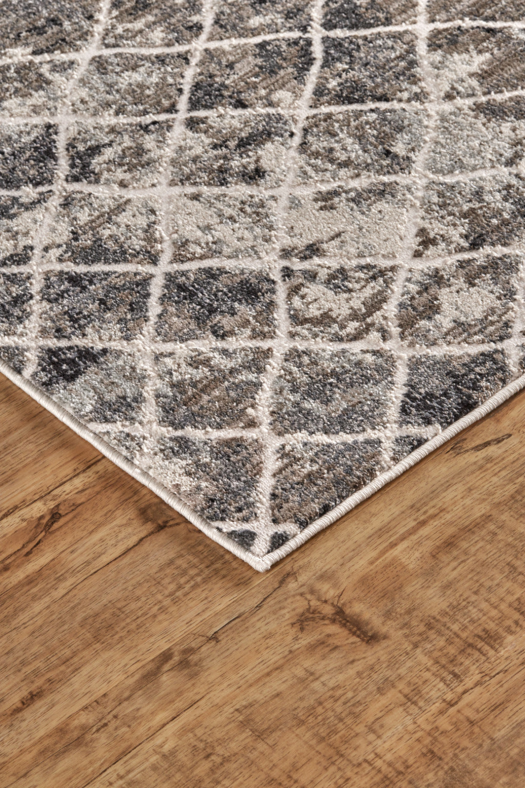 7' X 10' Ivory Gray And Taupe Abstract Stain Resistant Area Rug