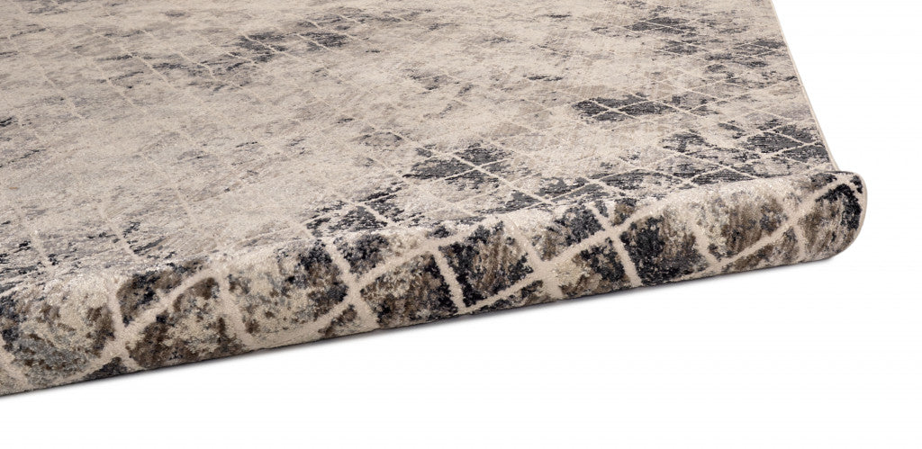 7' X 10' Ivory Gray And Taupe Abstract Stain Resistant Area Rug