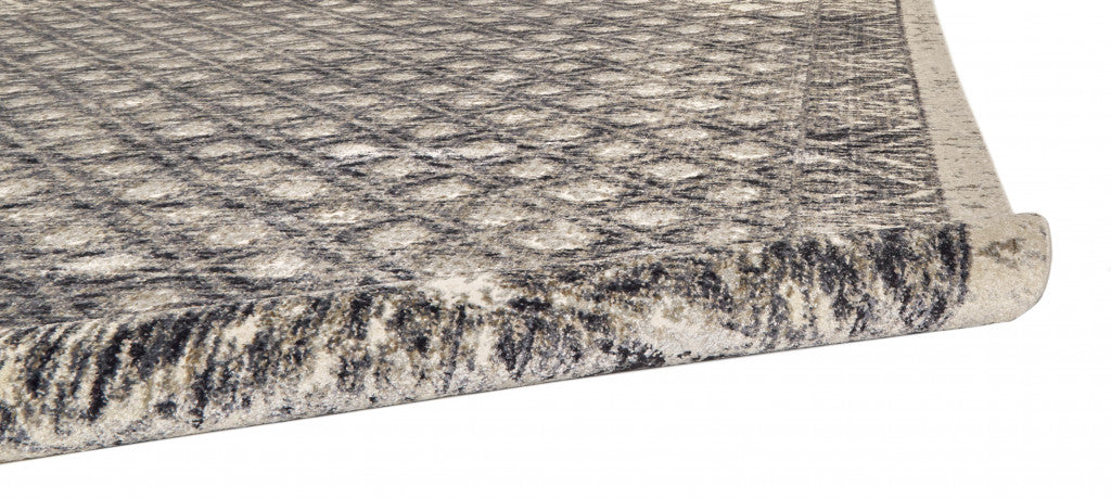 4' X 6' Ivory Black And Taupe Abstract Stain Resistant Area Rug