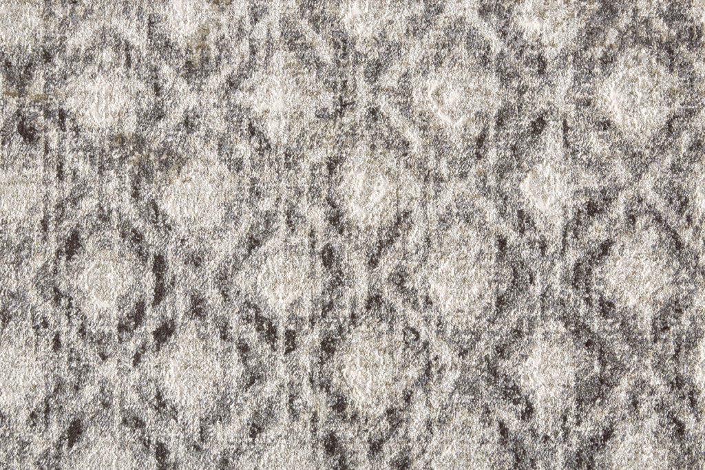 4' X 6' Ivory Black And Taupe Abstract Stain Resistant Area Rug