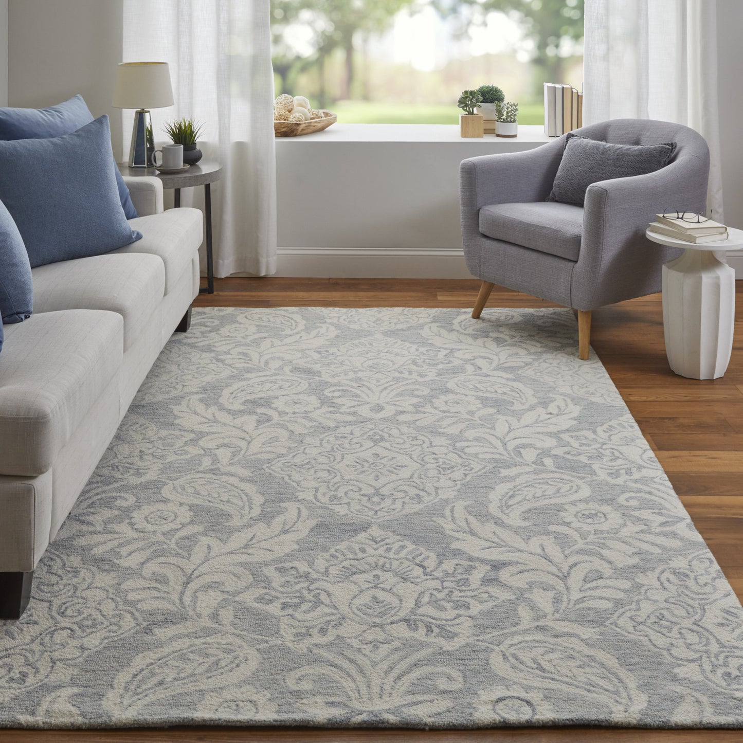 9' X 12' Blue And Ivory Wool Paisley Tufted Handmade Stain Resistant Area Rug