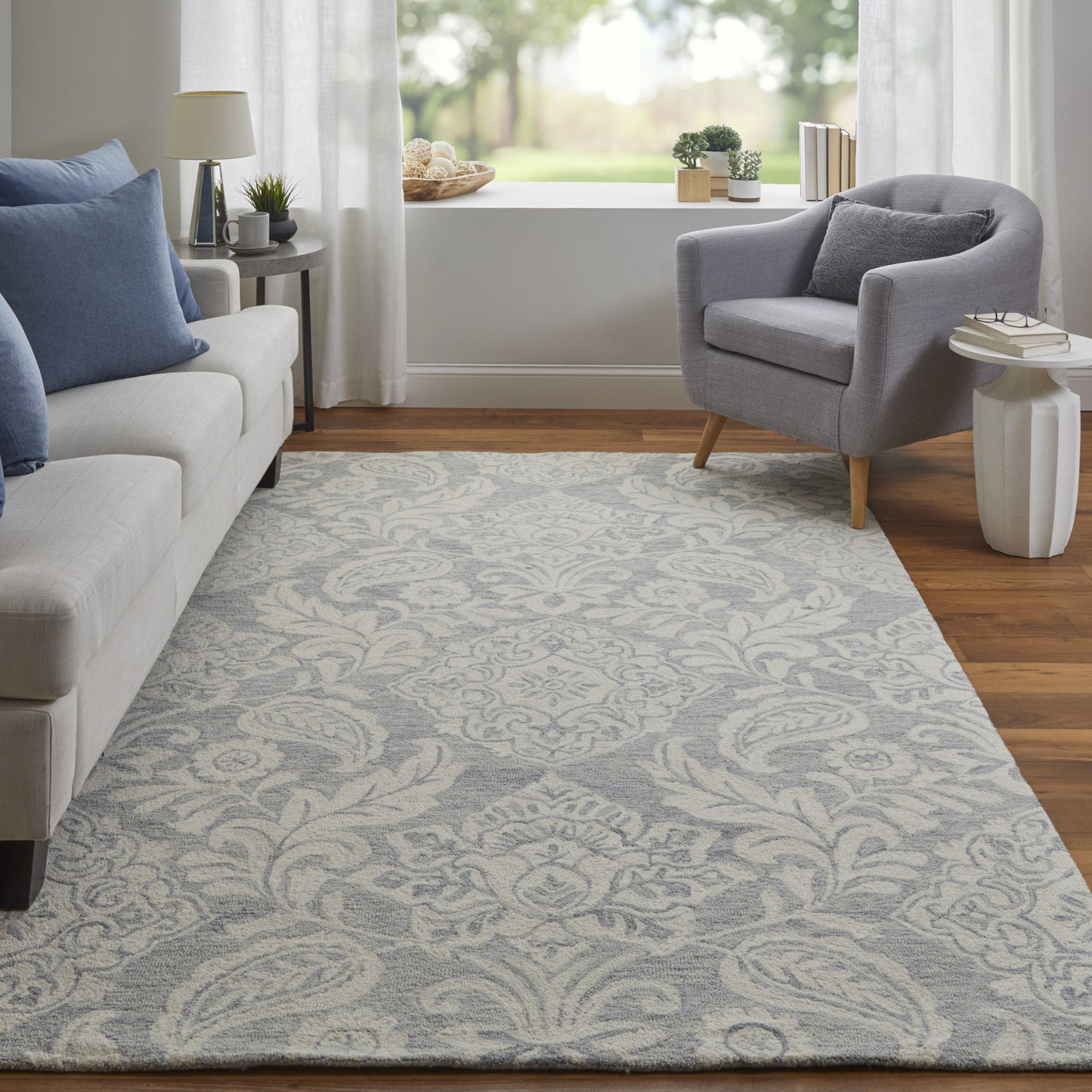 9' X 12' Blue And Ivory Wool Paisley Tufted Handmade Stain Resistant Area Rug