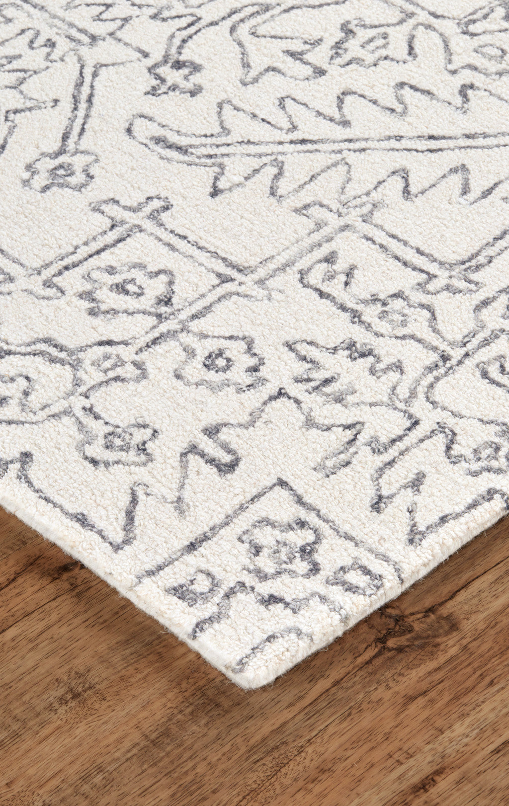 5' X 8' Ivory And Brown Wool Floral Tufted Handmade Stain Resistant Area Rug