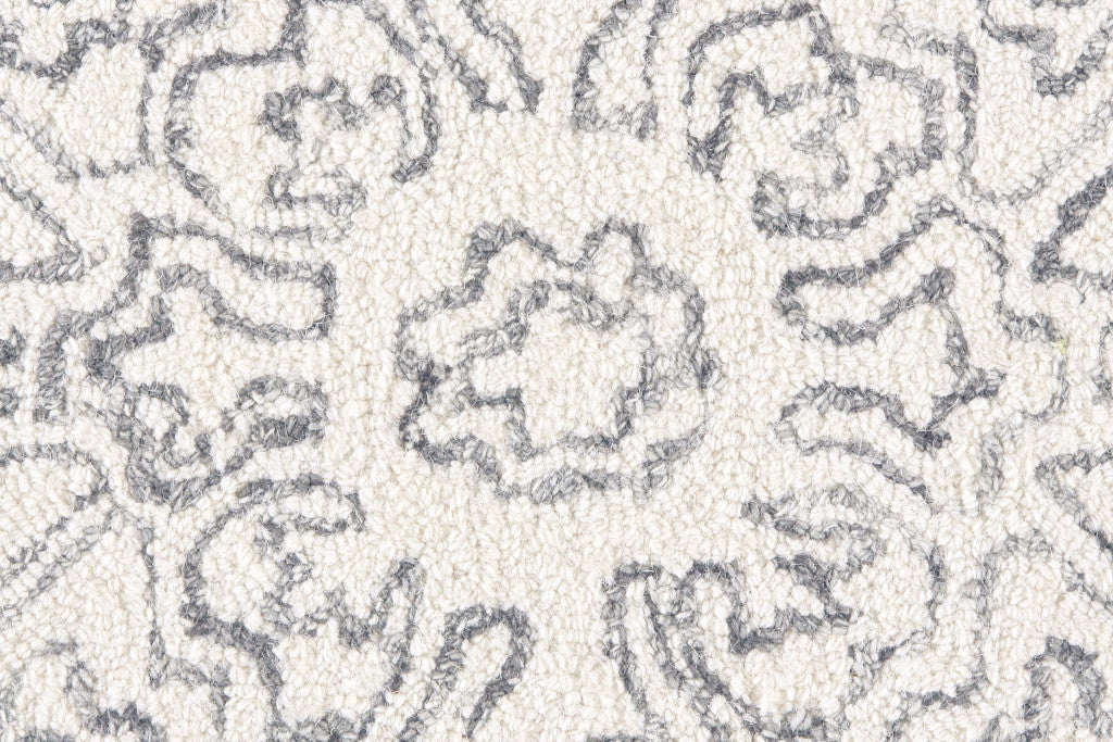 5' X 8' Ivory And Brown Wool Floral Tufted Handmade Stain Resistant Area Rug