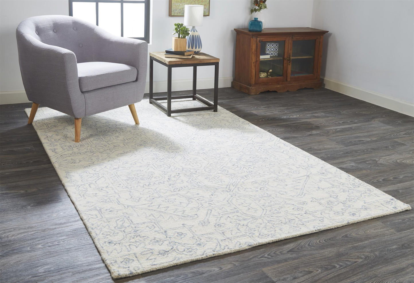 5' X 8' Ivory And Gray Wool Floral Tufted Handmade Stain Resistant Area Rug