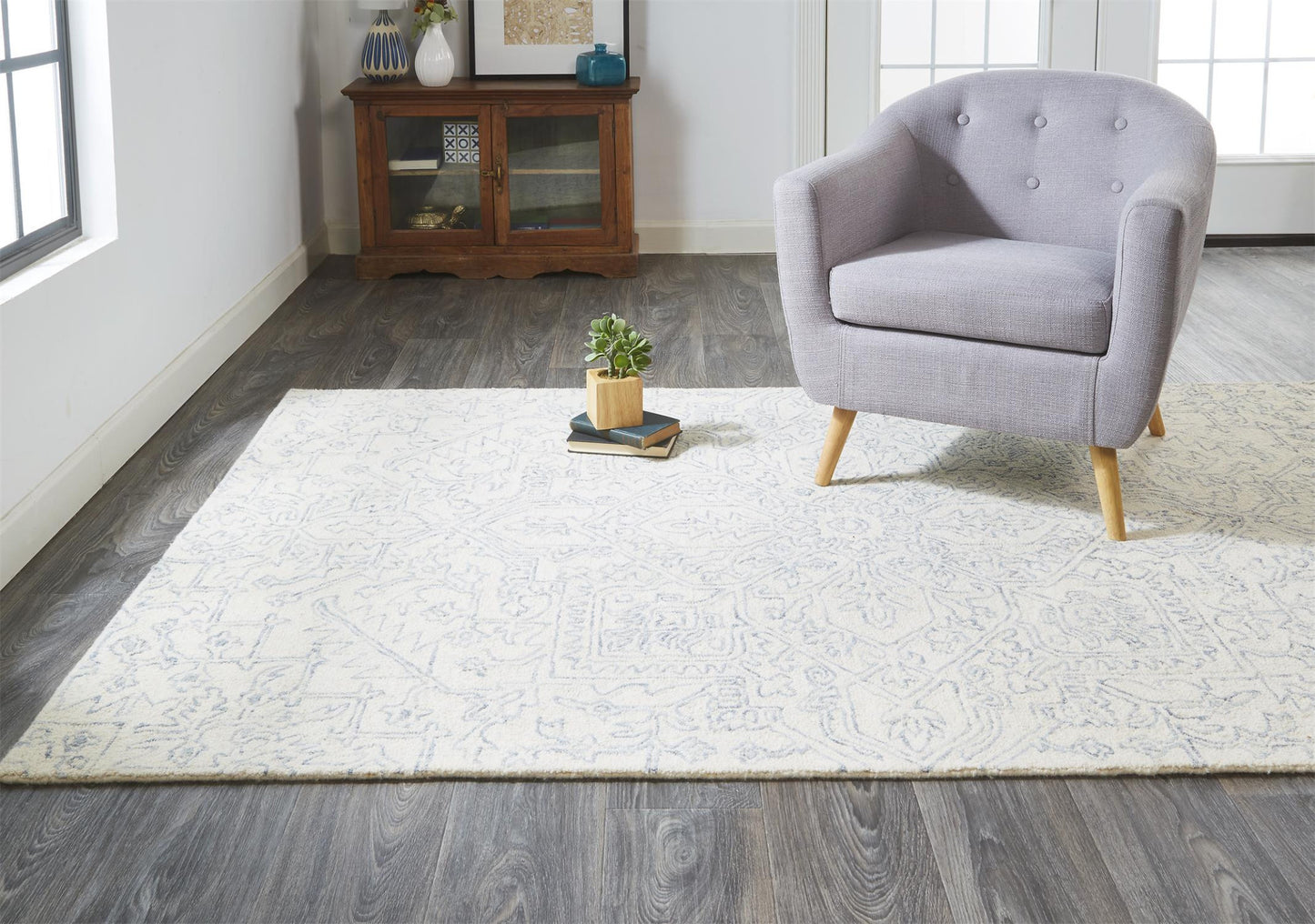5' X 8' Ivory And Gray Wool Floral Tufted Handmade Stain Resistant Area Rug