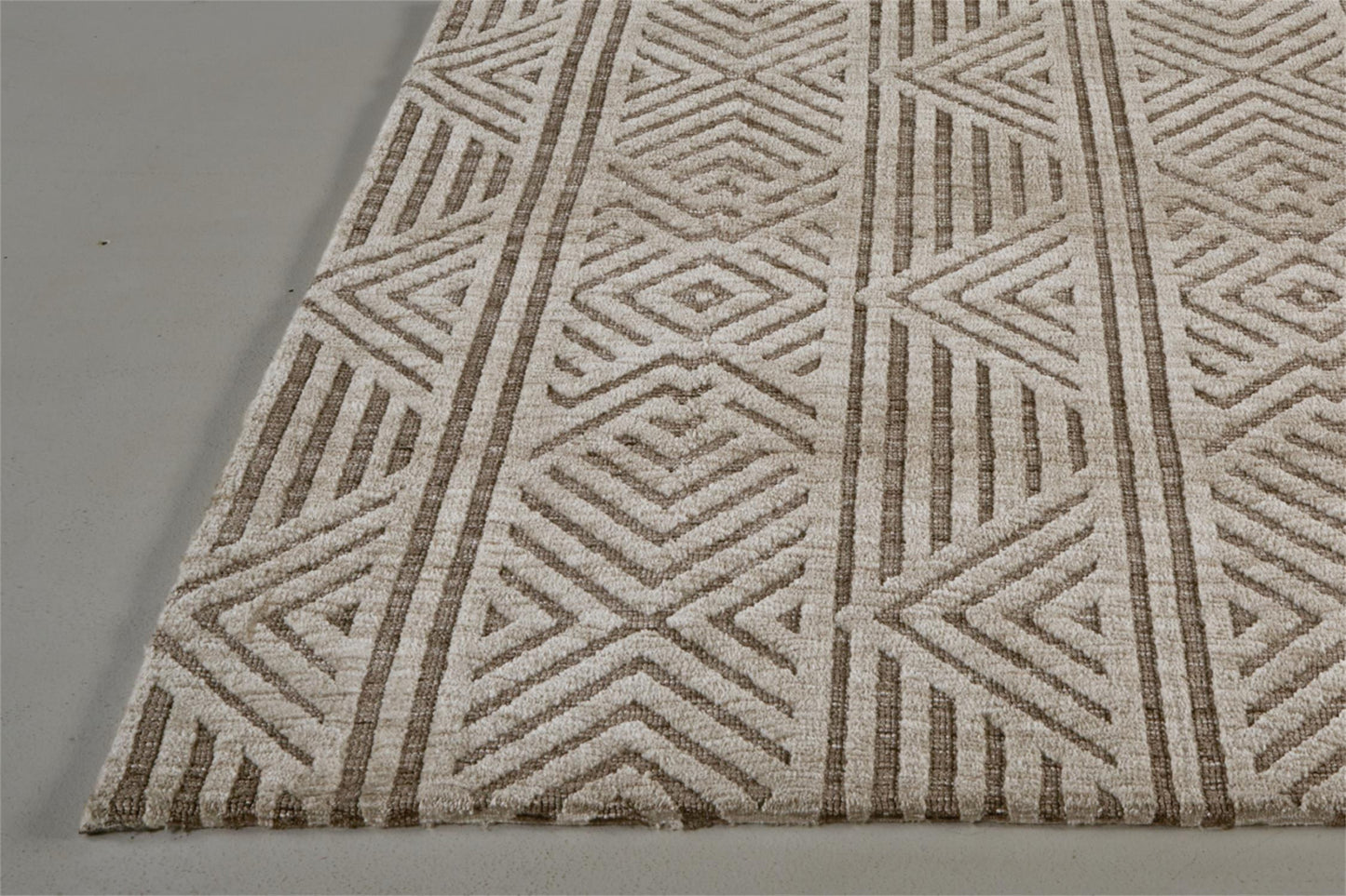 4' X 6' Tan Ivory And Brown Geometric Stain Resistant Area Rug