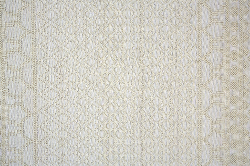 4' X 6' Gray And Ivory Wool Geometric Hand Woven Area Rug With Fringe