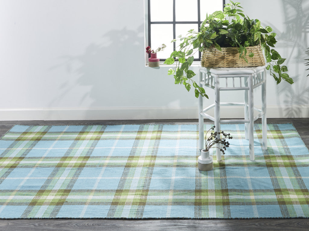5' X 8' Ivory Blue And Black Abstract Hand Woven Stain Resistant Area Rug