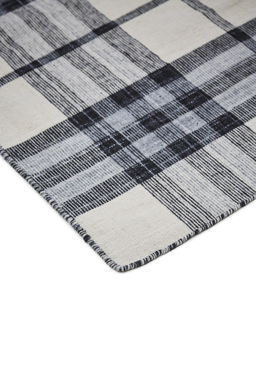 5' X 8' Ivory Blue And Black Abstract Hand Woven Stain Resistant Area Rug