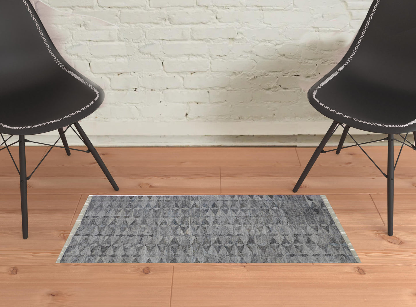 5' X 8' Gray Silver And Ivory Geometric Hand Woven Stain Resistant Area Rug With Fringe