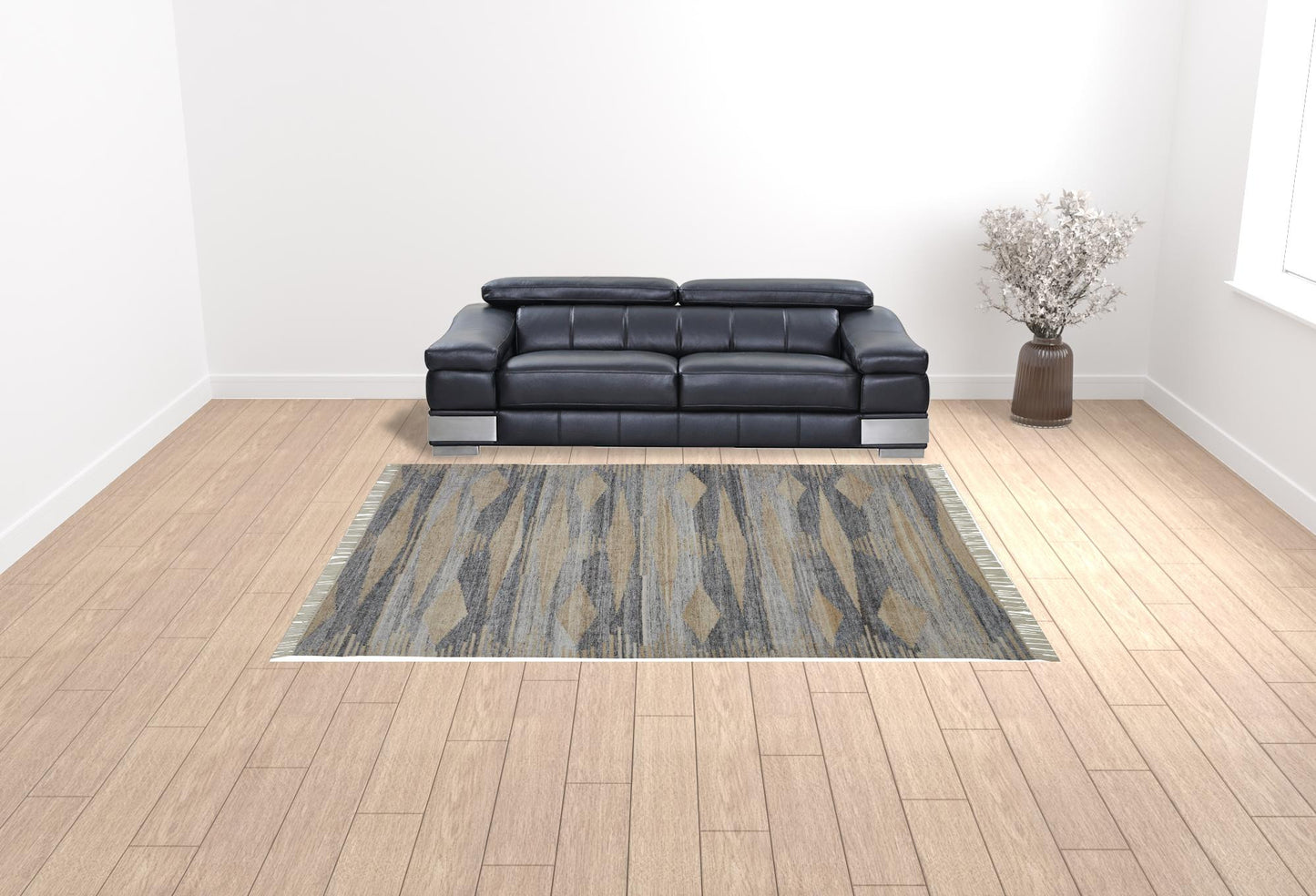 5' X 8' Gray Tan And Silver Abstract Hand Woven Stain Resistant Area Rug With Fringe