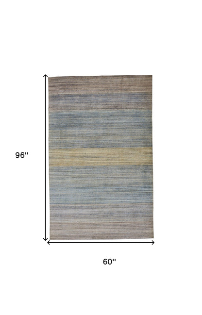 2' X 3' Gold Ivory And Gray Abstract Stain Resistant Area Rug