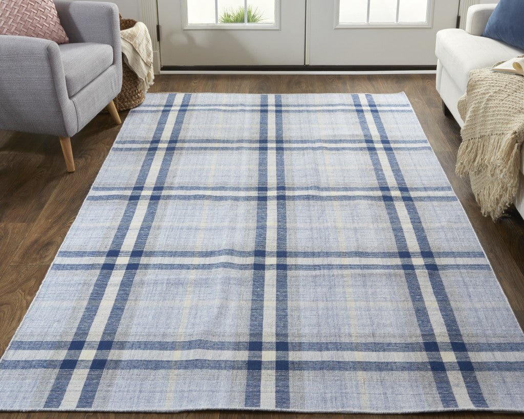 5' X 8' Ivory Blue And Black Abstract Hand Woven Stain Resistant Area Rug