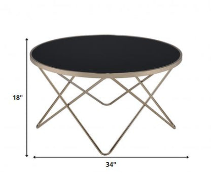 34" Black And Gold Glass And Iron Round Coffee Table