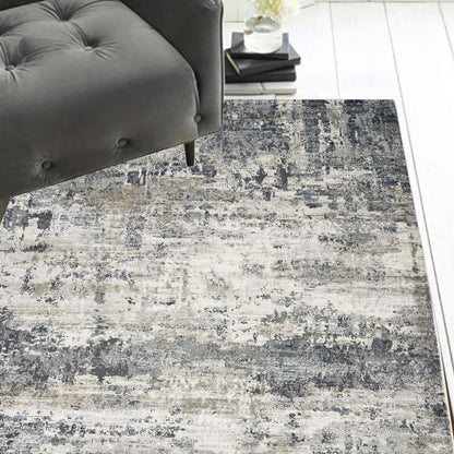 8' Ivory Teal Machine Woven Abstract Round Indoor Area Rug