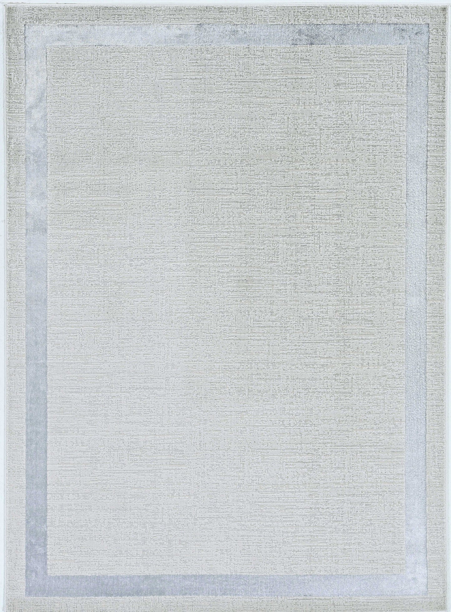 5'X8' Ivory Silver Machine Woven Bordered Indoor Area Rug