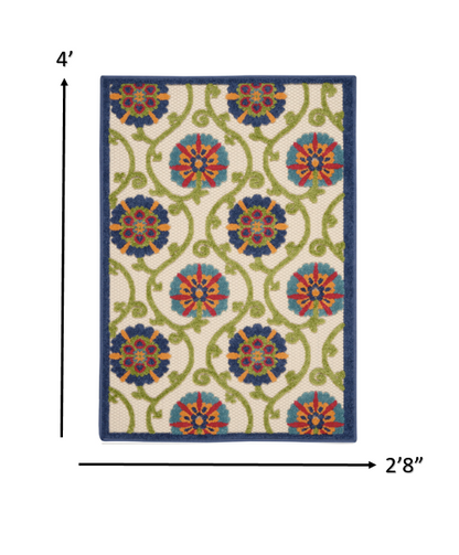 4' X 6' Ivory And Blue Floral Indoor Outdoor Area Rug