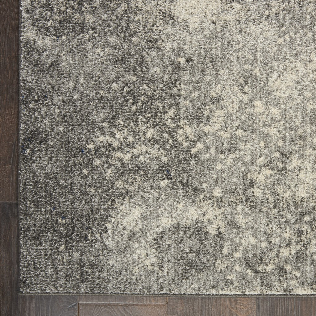 5' Gray And Ivory Round Abstract Power Loom Area Rug