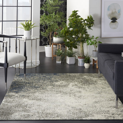 5' Gray And Ivory Round Abstract Power Loom Area Rug
