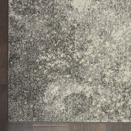 5' Gray And Ivory Round Abstract Power Loom Area Rug