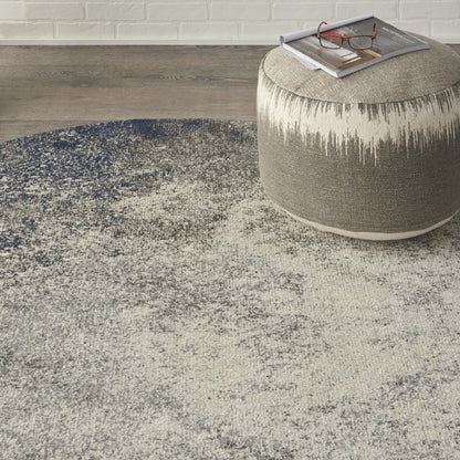 5' Gray And Ivory Round Abstract Power Loom Area Rug