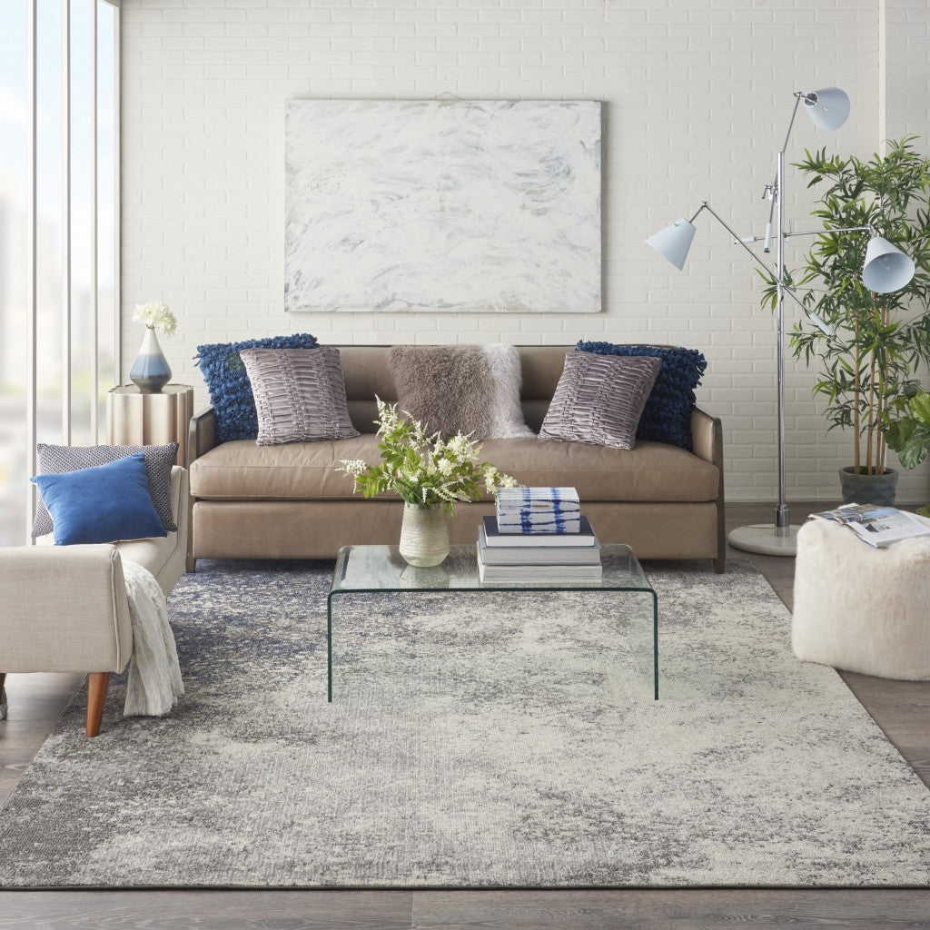 5' Gray And Ivory Round Abstract Power Loom Area Rug