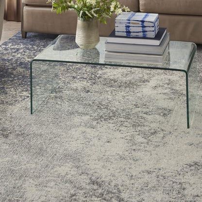5' Gray And Ivory Round Abstract Power Loom Area Rug
