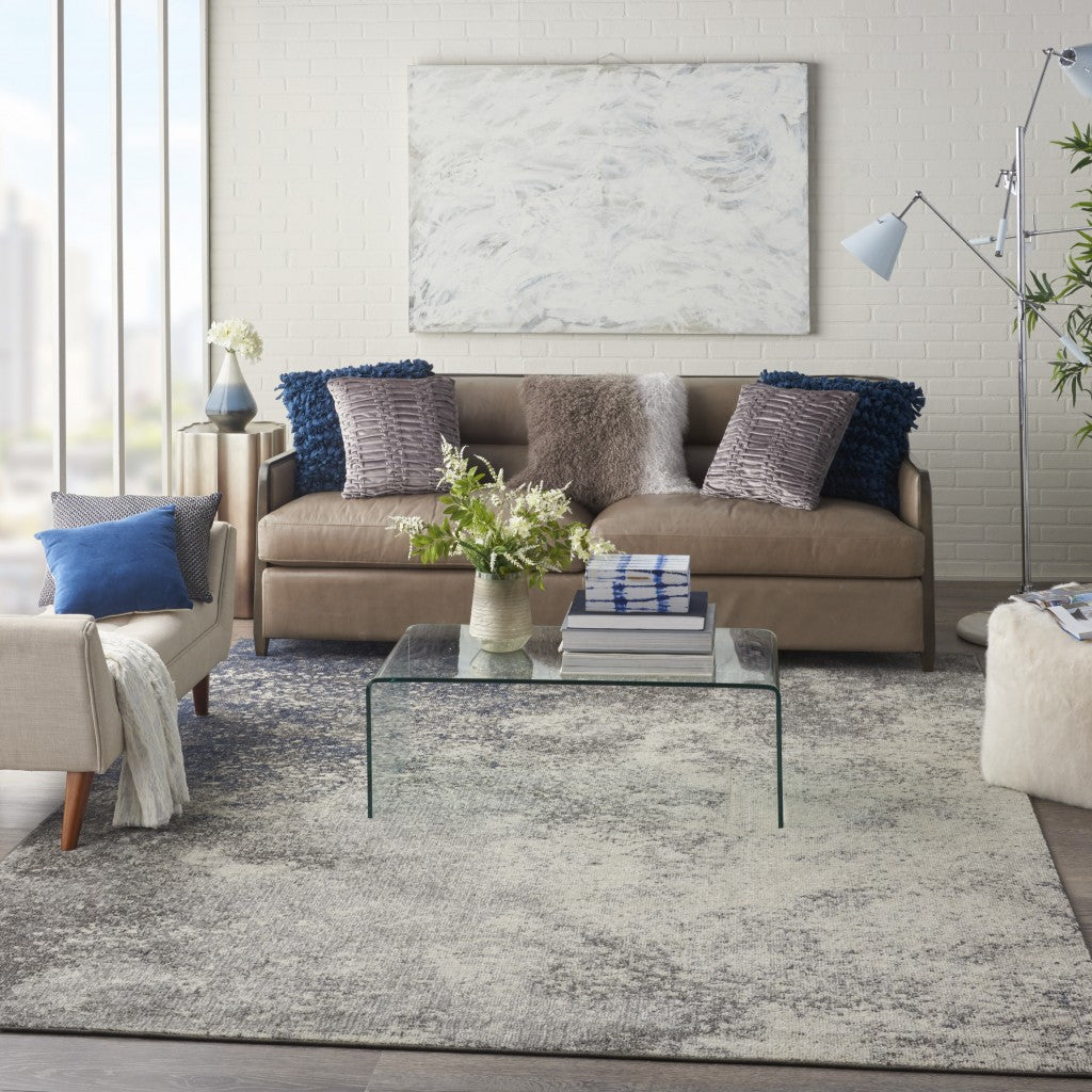 5' Gray And Ivory Round Abstract Power Loom Area Rug