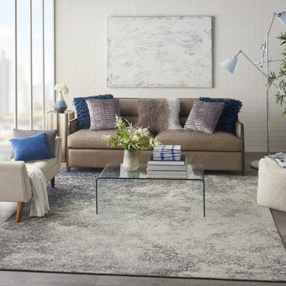 5' Gray And Ivory Round Abstract Power Loom Area Rug