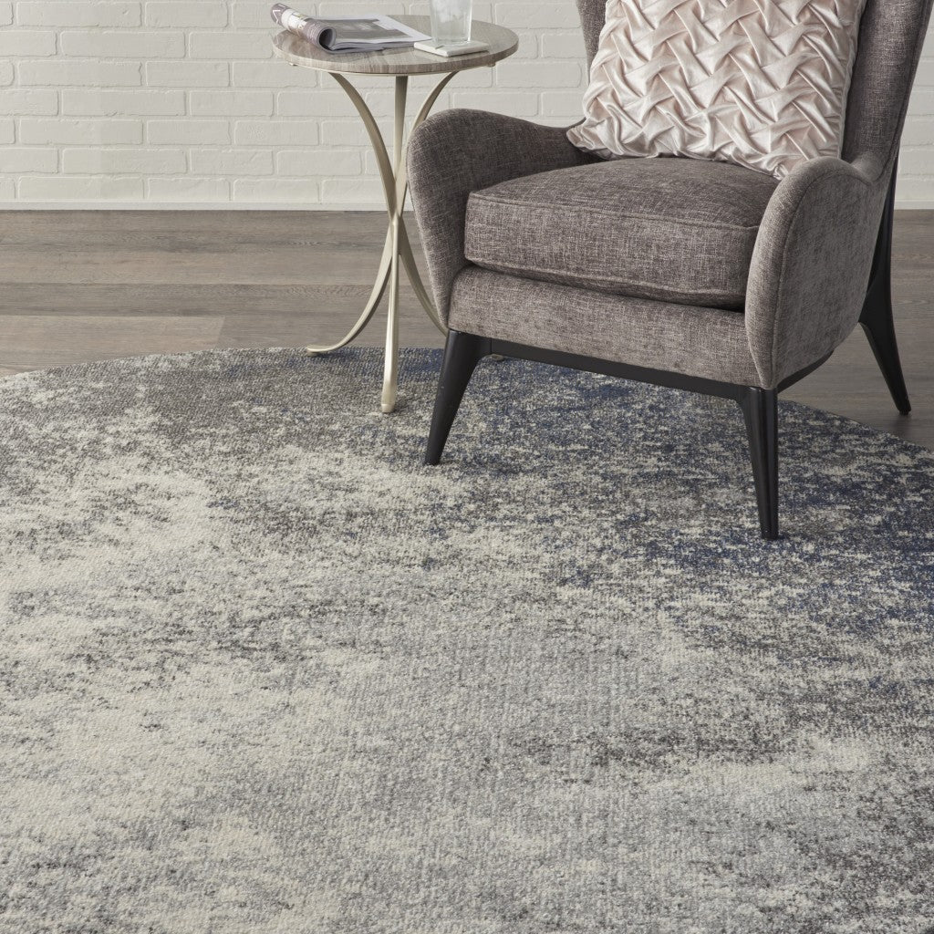 5' Gray And Ivory Round Abstract Power Loom Area Rug