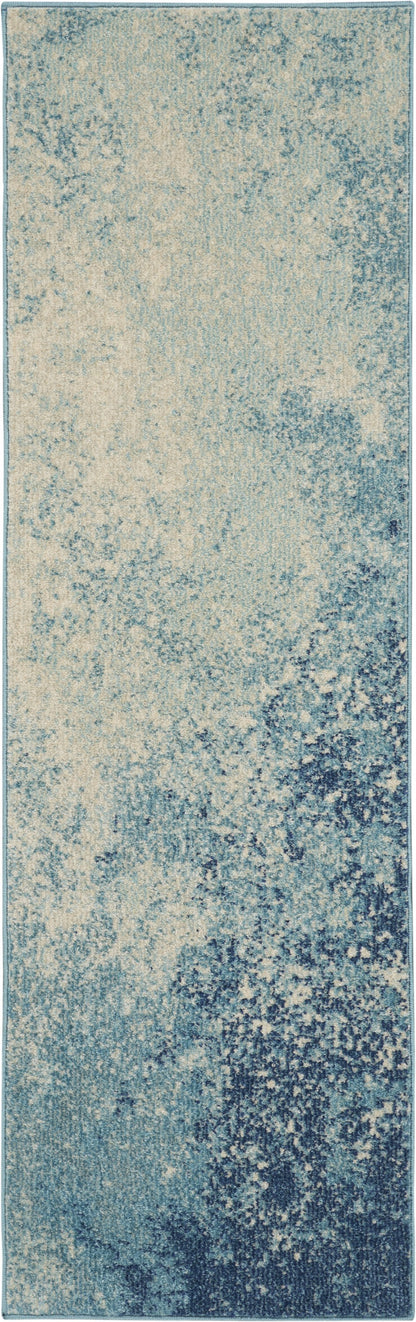 5' X 7' Ivory And Blue Abstract Power Loom Area Rug