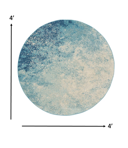 5' X 7' Ivory And Blue Abstract Power Loom Area Rug