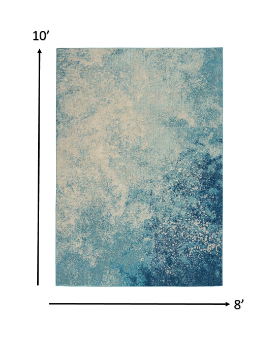5' X 7' Ivory And Blue Abstract Power Loom Area Rug
