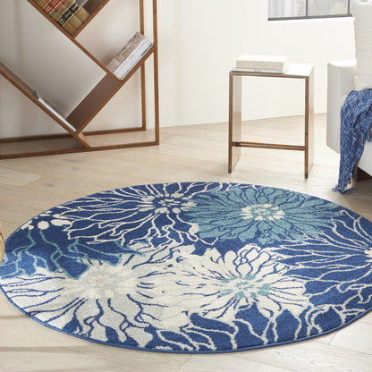 5' Blue And Ivory Round Floral Dhurrie Area Rug