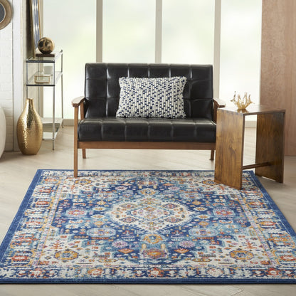 5' X 7' Blue And Ivory Power Loom Area Rug