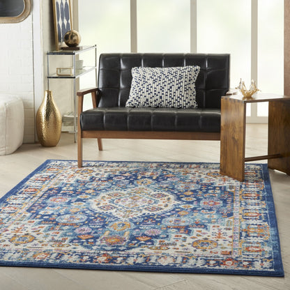 5' X 7' Blue And Ivory Power Loom Area Rug