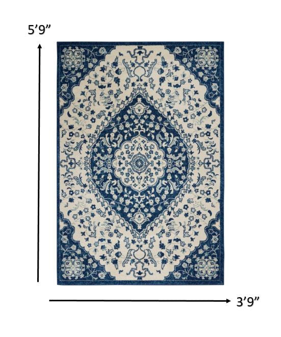 8' X 10' Blue And Ivory Power Loom Area Rug