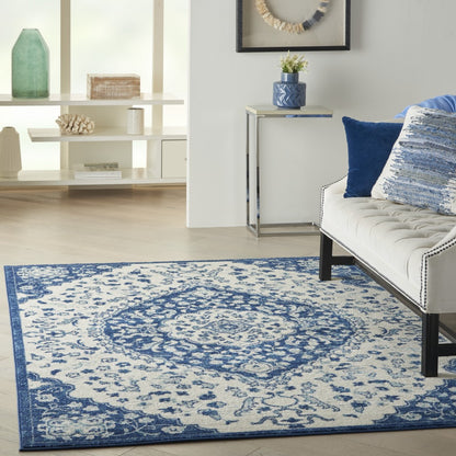 8' X 10' Blue And Ivory Power Loom Area Rug