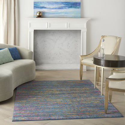 5' X 7' Blue And Orange Abstract Power Loom Area Rug